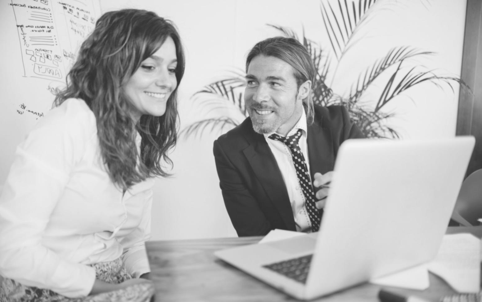 Business professionals analyzing financial documents and terminology guides