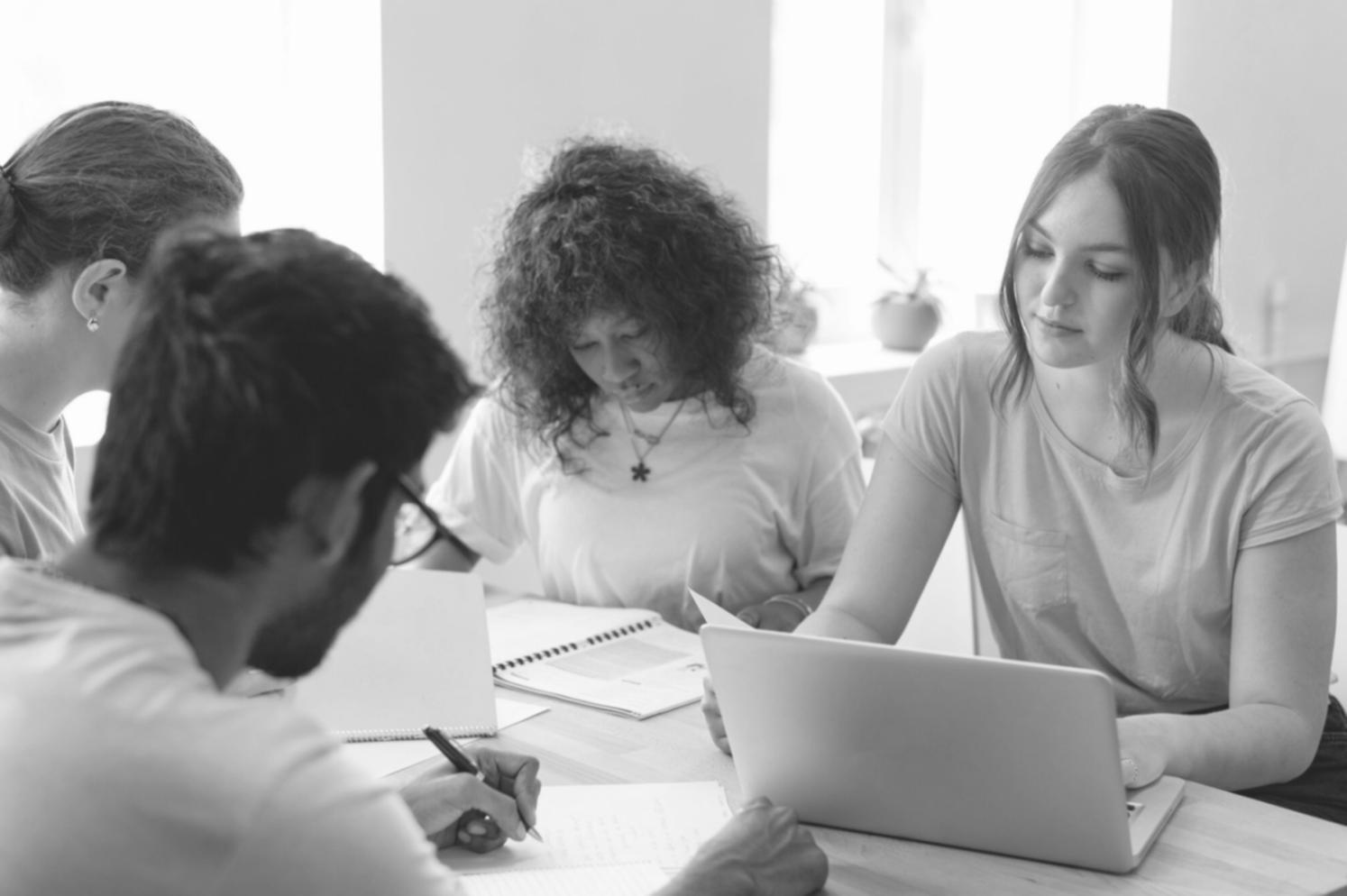 Financial professionals reviewing market data and terminology